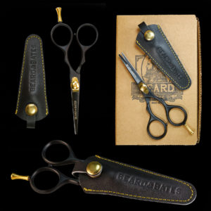 A great set of trimming scissors is a necessity: for this reason Beard & Bates has designed, developed and hand-crafted some of the best shears money can buy. Our 1878 Black Label Shears were inspired by classic 19th Century grooming scissors which were prized possessions carried by cavalry commanders who favored long and intimidating facial hair. Taking a cue from the fact that Cavalry soldiers' tools of the trade were carbines, pistols and sabers, we created a unique embossed genuine leather holster/scabbard to complement these fine shears. The best modern steel is Japanese, and the1878 Black Label Shears are crafted from the finest J2 420 Japanese steel and heat treated to Rockwell Hardness of 55-56. The scissors are 4.5" in total, currently TSA approved for travel, and the blades are razor sharp convex edge blades, which are hollow ground to make precision cuts, and require no resharpening. This quality level is on par with profession hair cutting scissors which cost $250-$500. The traditional ergonomic design enables you to put your ring finger through the hole, use the two indentations to rest your index and middle fingers, all while allowing your pinky to sit atop the brass finger rest. This provides one much more fluid control when trimming. It had become historically common for Calvary forces to wear imposing facial hair, whether it be long mustaches or full beards, so as to appear more imposing to the enemy, and so specific appearance was an important "weapon." Weapon or not, your facial hair will benefit from this quality holstered set of shears.
